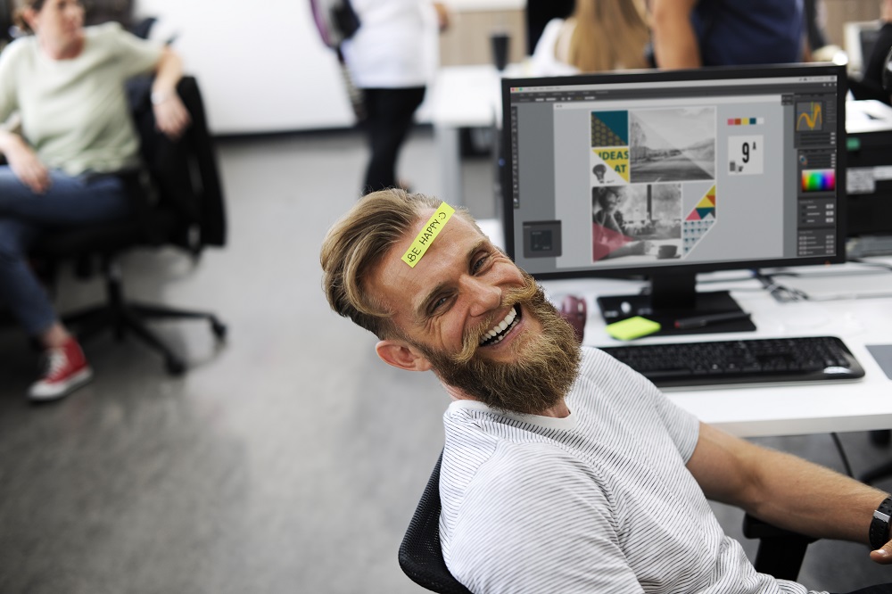 Work Wellness: 4 Ways Your Employees Perform Better When They’re Happy